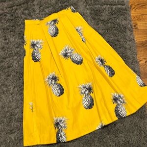 Ann Taylor. Golden midi skirt with pineapples. size 10.